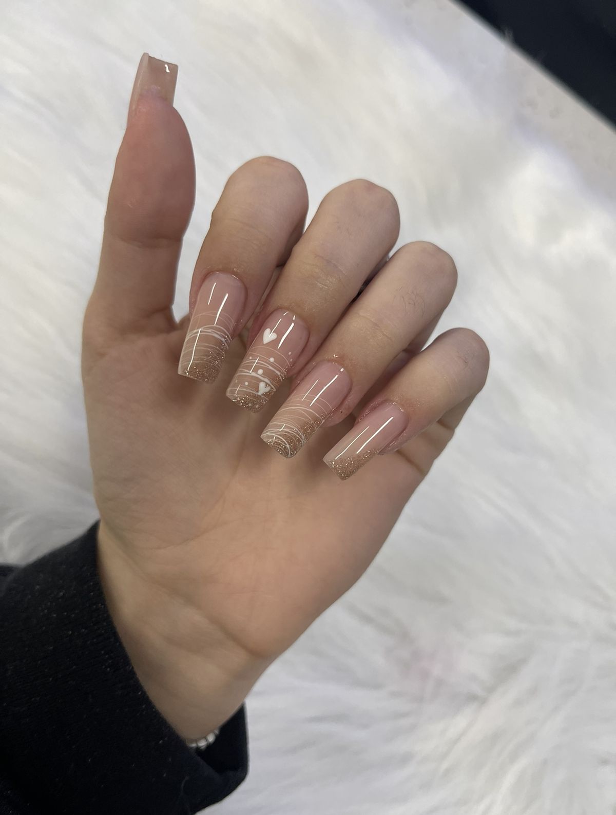 Sheer nude almond nails at KS Beauty Center